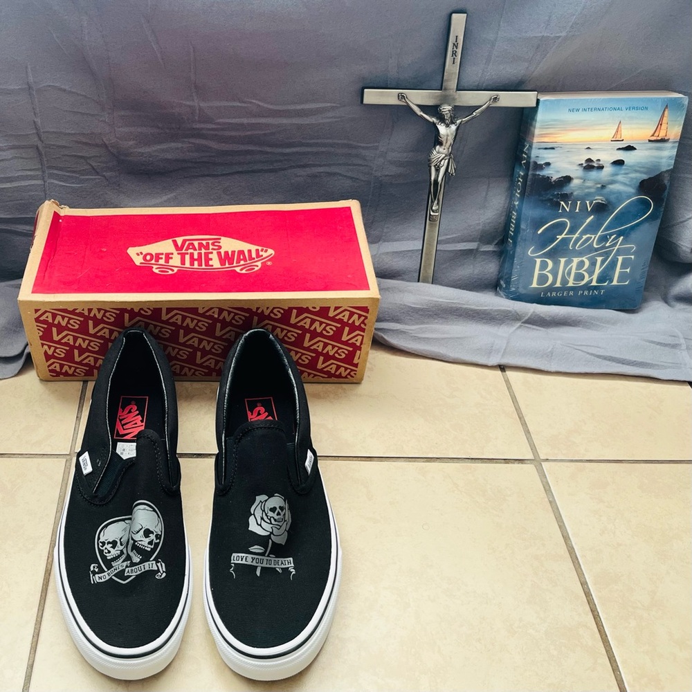 Vans Black Slip-On Sneakers with Skull Graphics